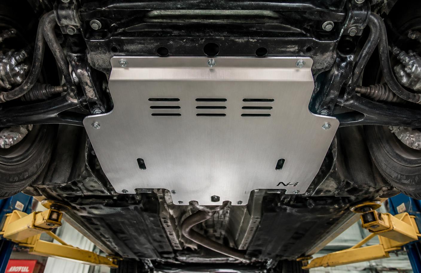 Aluminum Evolution skid plate fitted under a Volkswagen